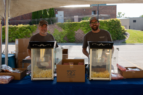Staff manning two popcorn machines