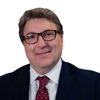 A headshot of Mark Antakli